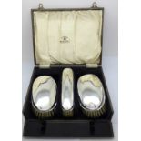 A cased silver brush set, Mappin & Webb box