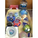 A collection of glass paperweights including Millefriori, Murano, Caithness, Eckhart, Okra, Selkirk,