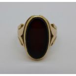 A yellow metal and onyx signet ring, marked 'HS', 7g, O