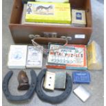 A case containing playing cards, cribbage board, etc.