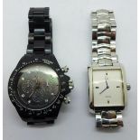 Two wristwatches; stainless steel Guess designer watch and Toy Watch Company black dial chronograph