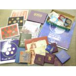 A collection of assorted coins, crowns, banknotes, uncirculated coin packs, 1982, 1983 and