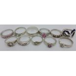 Eleven silver rings, 38g