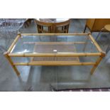 A bamboo, rattan and glass topped coffee table