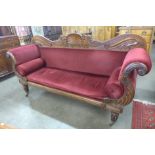 A Regency mahogany and upholstered scroll end sette
