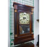 A 19th Century American mahogany 30-hour wall clock by Chauncey Jerome