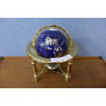 A small brass and gem set terrestrial globe