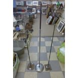 Three steel haberdashery shop stands