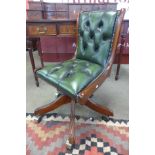 A beech and green leather desk chair