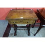 A Victorian rosewood lady's sewing table