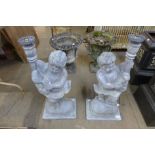 A pair of painted wood cherub table lamps