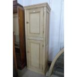 A pine two door housekeeper's cupboard