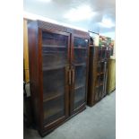 An oak bookcase and a mahogany bookcase