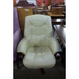 A beech and leather upholstered swivel chair