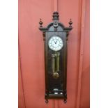 A mahogany double weight Vienna wall clock