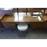 An Avalon teak dressing table and a stool