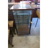 A mahogany display cabinet