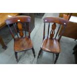 A pair of Victorian beech kitchen chairs