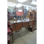 A walnut dressing table