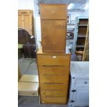 A teak effect chest of drawers and a bedside table