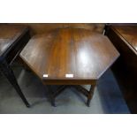 An Edward VII walnut octagonal centre table