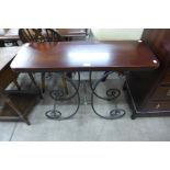 A French style wrought steel and beech topped console table