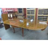 A 19th Century oak extending dining table