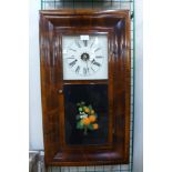 A 19th Century American mahogany 8-day ogee wall clock by E.N. Welch