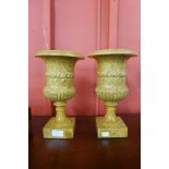 A pair of small 19th Century style marble campana shaped urns