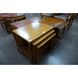 Two teak nests of tables, coffee table and ottoman