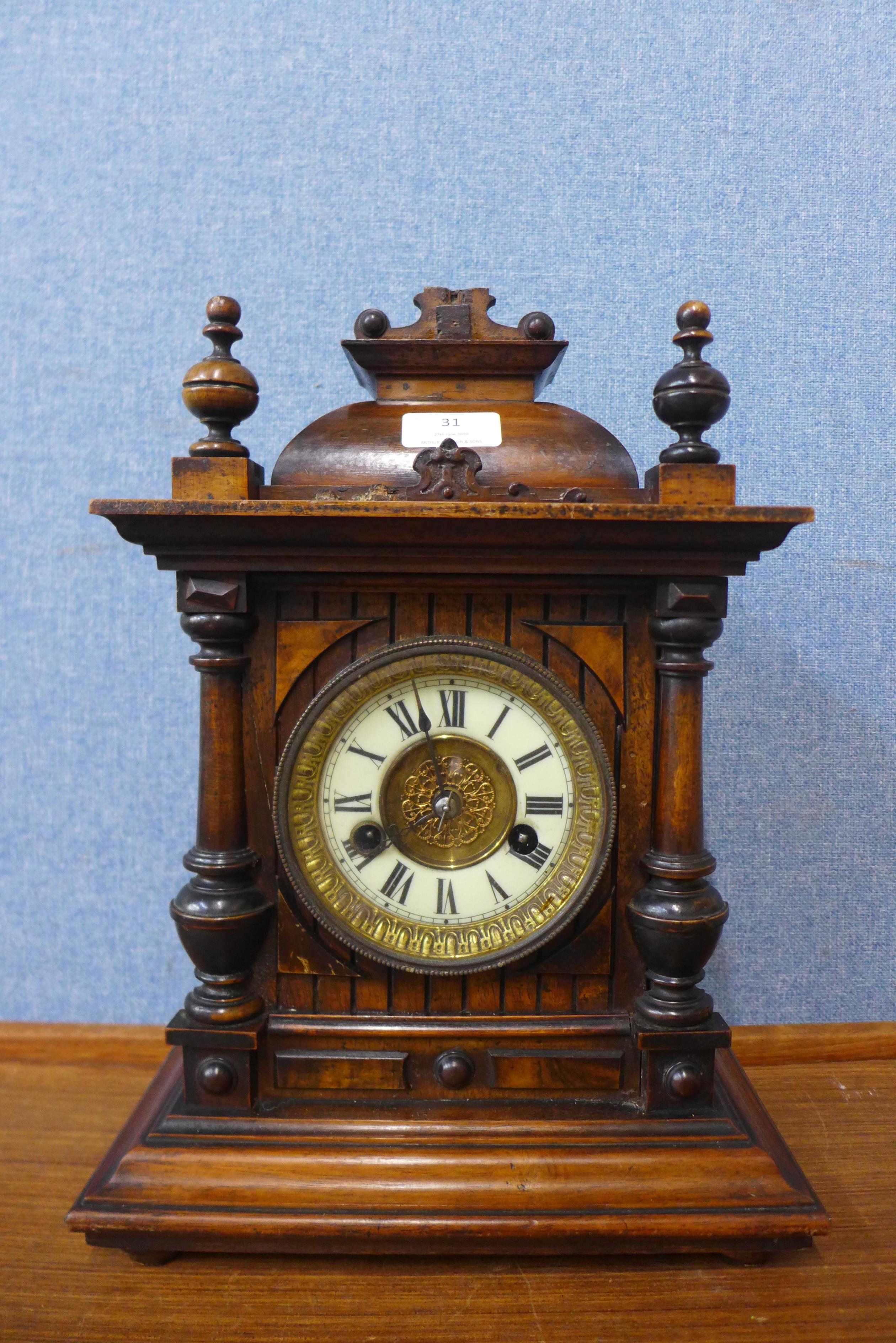 A 19th Century German walnut mantel clock