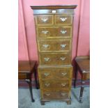 A George I style burr walnut chest on chest