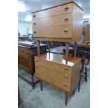 A pair of teak chests of drawers