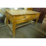A Victorian pine two drawer serving table