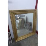 A gilt framed mirror