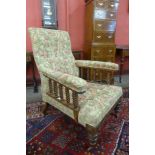 A Victorian walnut and upholstered armchair