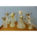Eight plated glass claret jugs