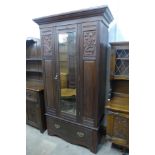 An Edward VII walnut wardrobe