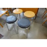 Two pairs of chrome stools