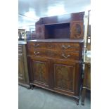 A Regency style inlaid mahogany side cabinet