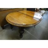 A Victorian mahogany extending dining table (missing winder)