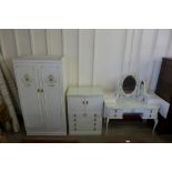 A French style cream three piece bedroom suite