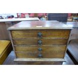 A Victorian oak table top chest