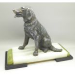 A spelter figure of a labrador on an Art Deco onyx base