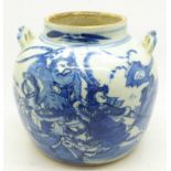 A Chinese blue and white jar or teapot, decorated with warriors (spout removed and plugged)