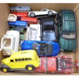 A collection of 1/18th scale and other die-cast model vehicles, some boxed