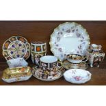 A collection of Royal Crown Derby, including a 4971 cup and saucer, a 2451 cup and saucer, cup a/