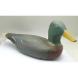 An American folk art decoy duck, stamped CWW