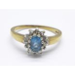 A 9ct gold, blue and white stone cluster ring, 3.1g, R