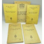 Four Air Raid Precautions Handbooks, (2+2), and a Home Office Air Raids booklet